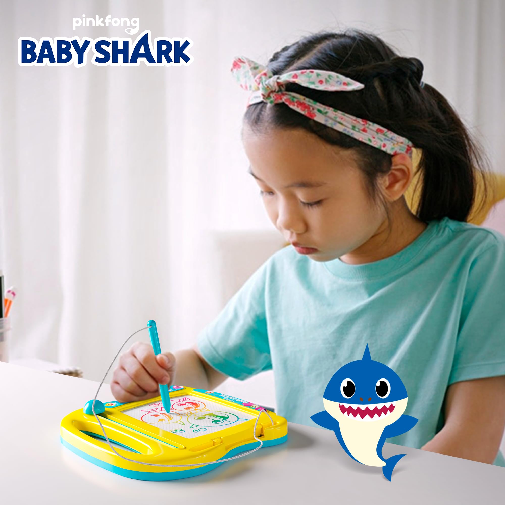 Lollipop Baby Shark travel board with shape stamps for easy shapes.