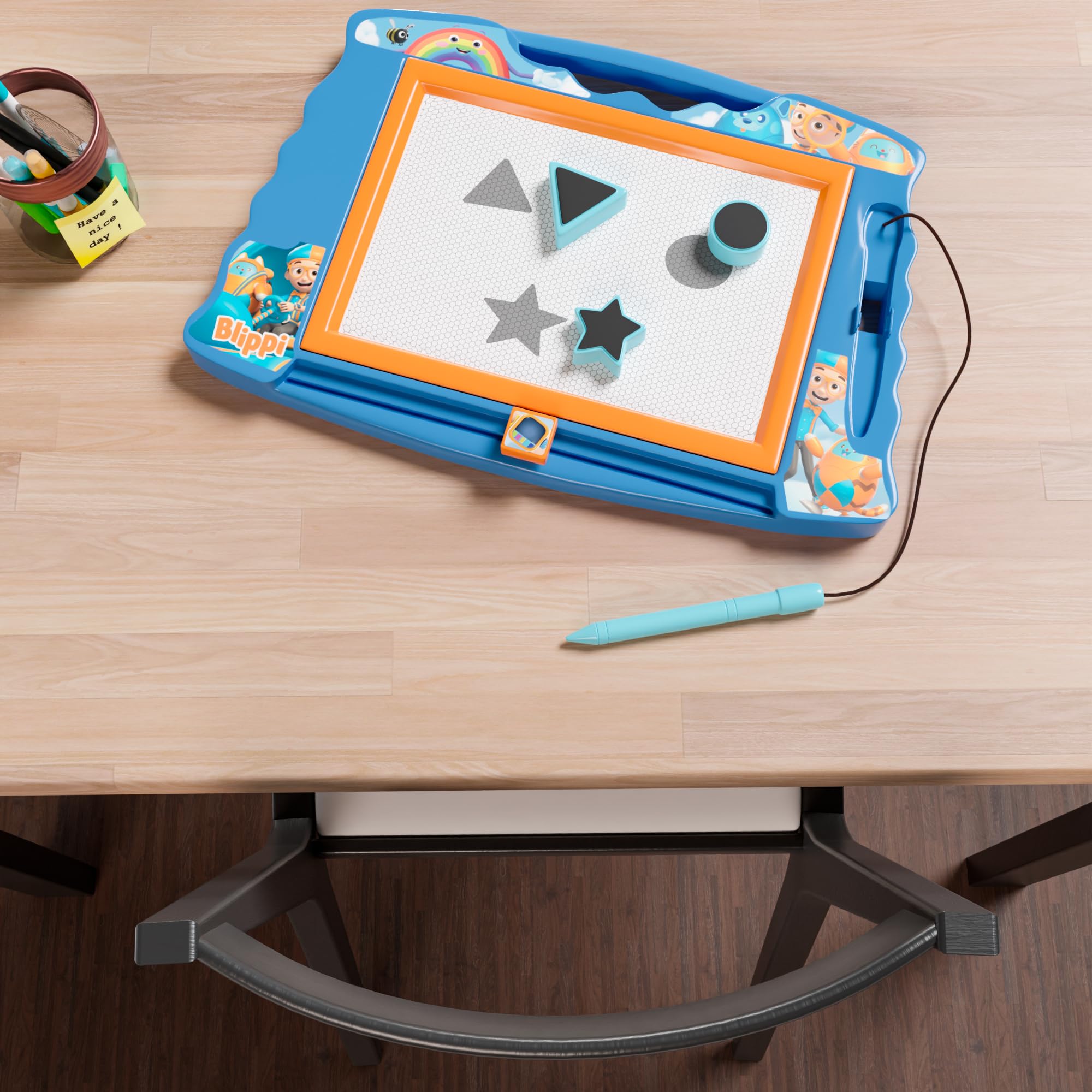 Lollipop Blippi magnetic sketcher showing built-in pen storage for easy access.