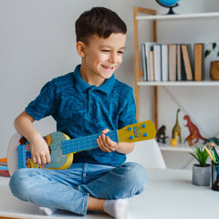Lollipop mini guitar for early rhythm and melody exploration.