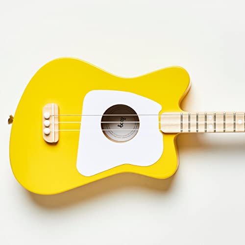 Loog Mini nylon strings close-up showing gentle touch and playability.