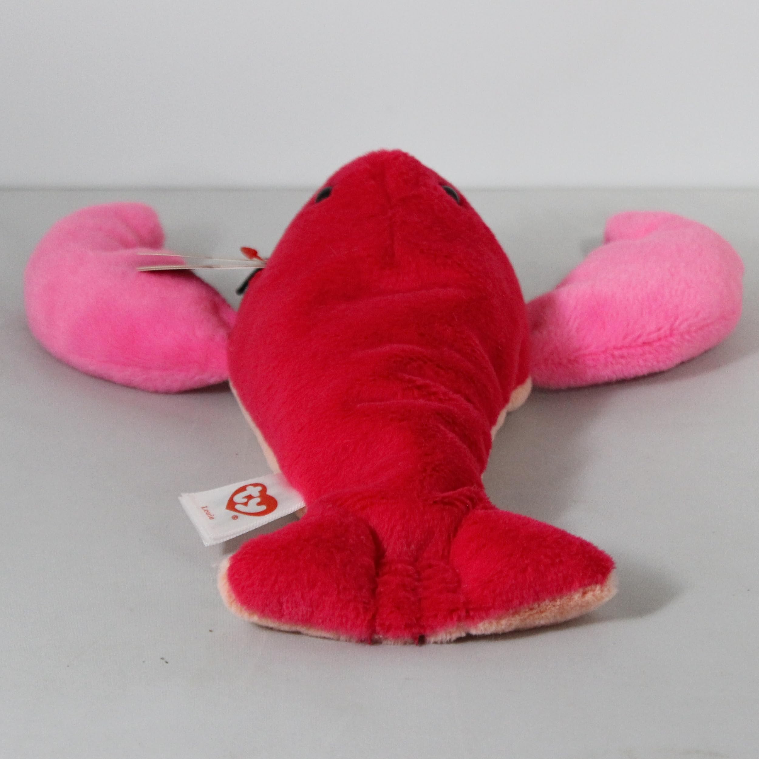 Ty Louie Lobster Beanie Baby stands 7.5 inches tall for compact display.