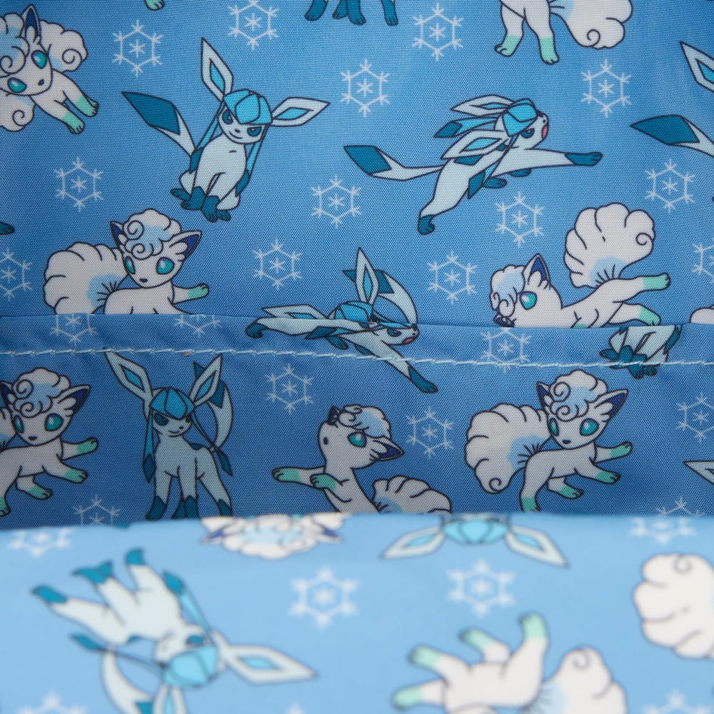 Loungefly Pokémon coordinating interior lining keeps belongings organized.
