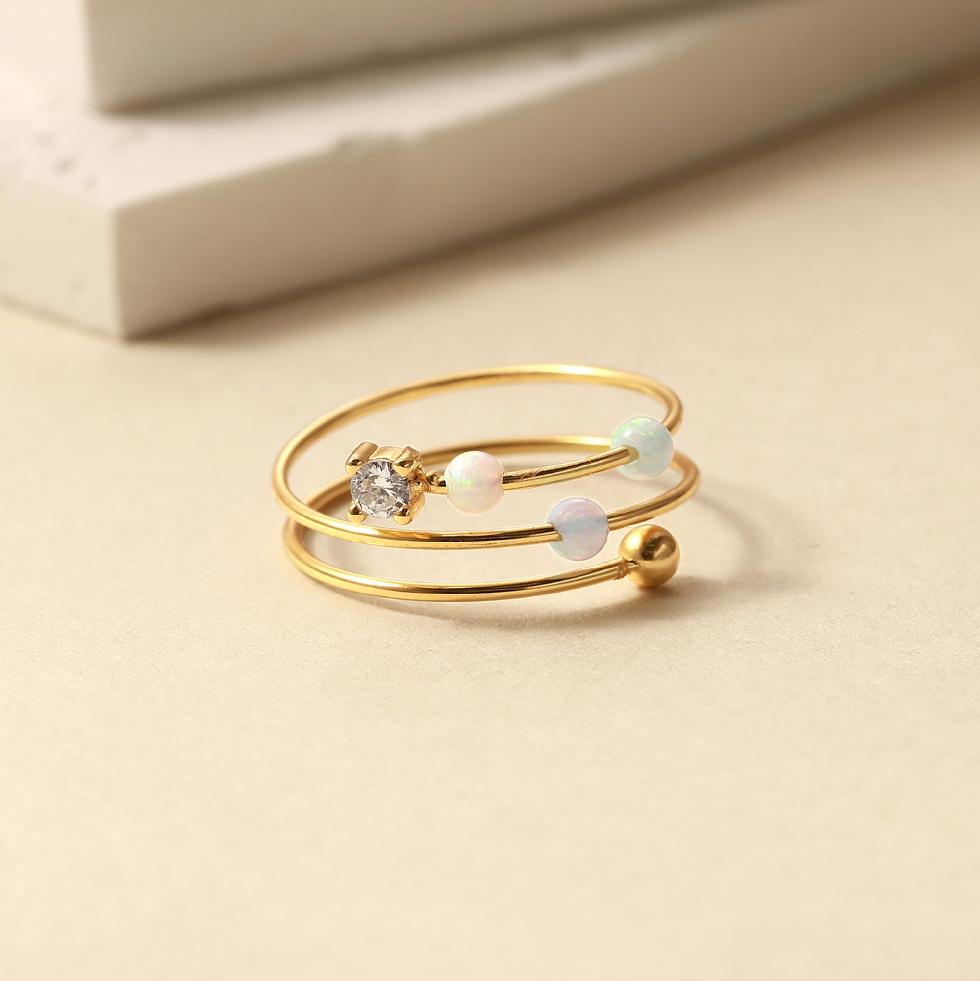 LOVECOM three-turnable opal beads ring enhances stacking options and personal style