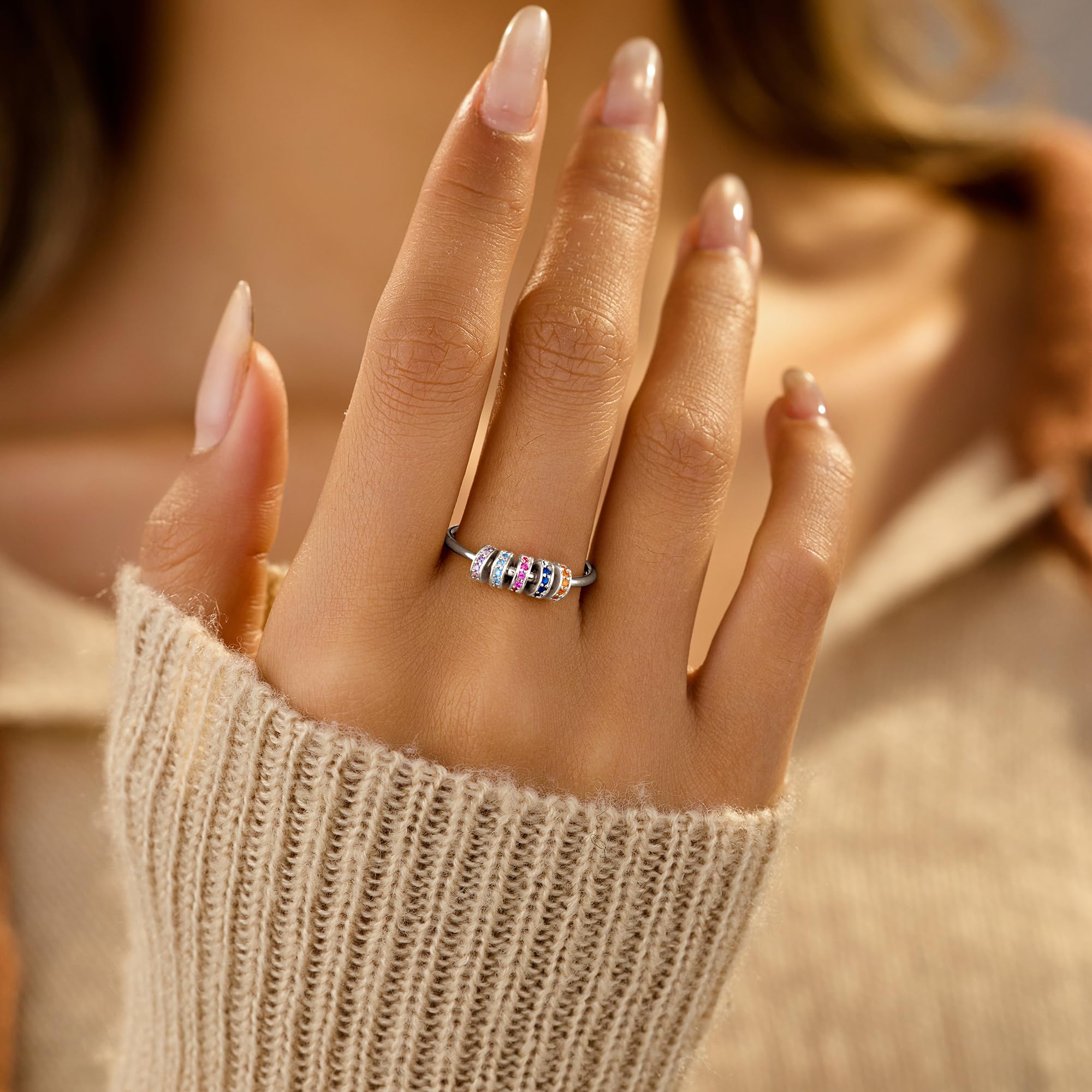 LOVECOM S925 silver fidget ring polished surface highlights elegance.