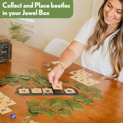 Family around Jewel Box, enjoying a cozy game night together.