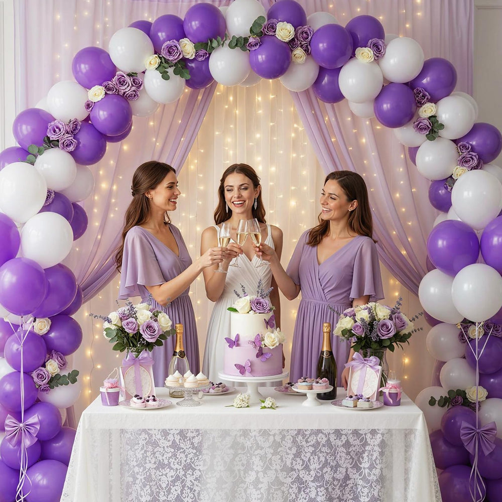 LovesTown purple balloon arch setup for elegant event backdrops.