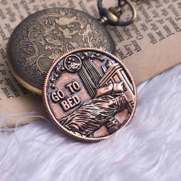 LParkin Just One More Chapter coin in hand evokes cozy reading rituals.