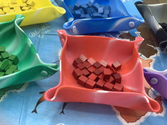 Luck Lab six-pack ideal for sorting chits and pieces at setup