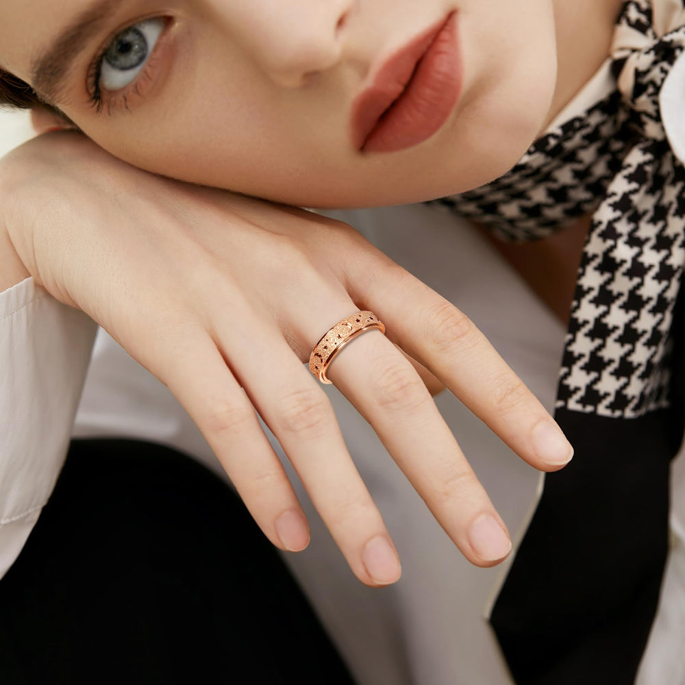 Moon-star hollow outer band on the LuckyAmor ring in a stylish side view