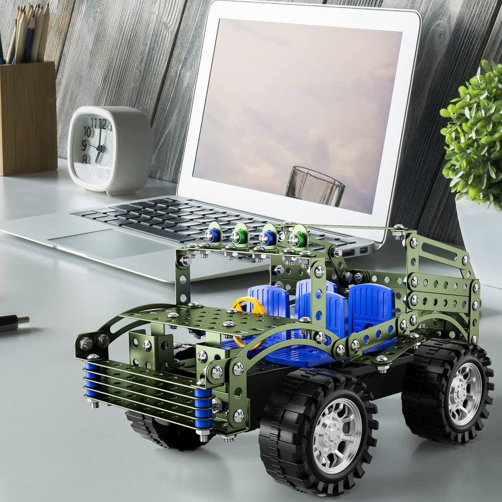 Lucky Doug army green truck body with steering wheel.