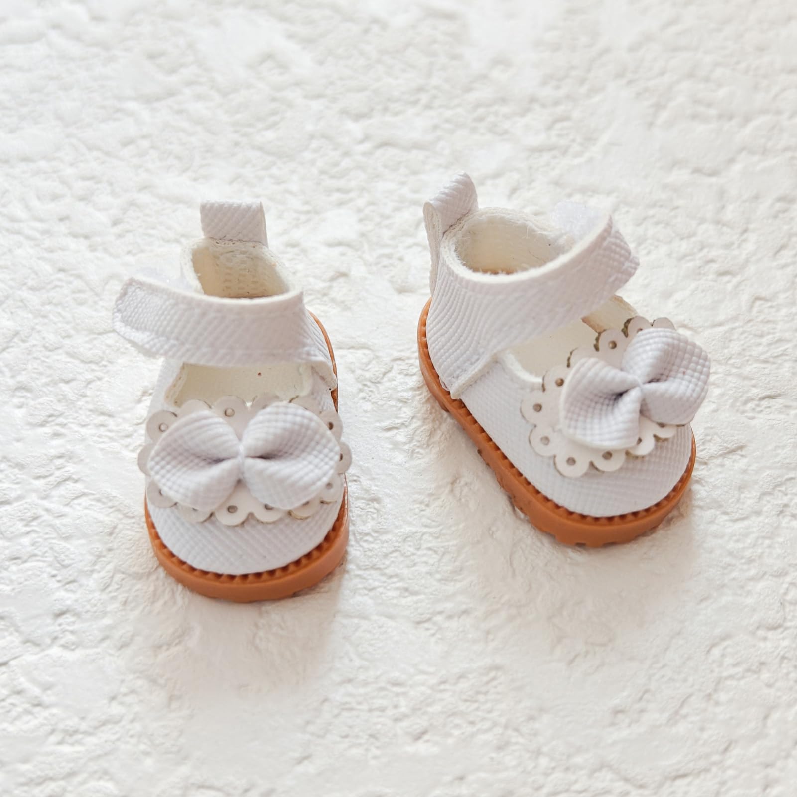 Lukax mini doll shoes on-doll-foot show quick-change style.