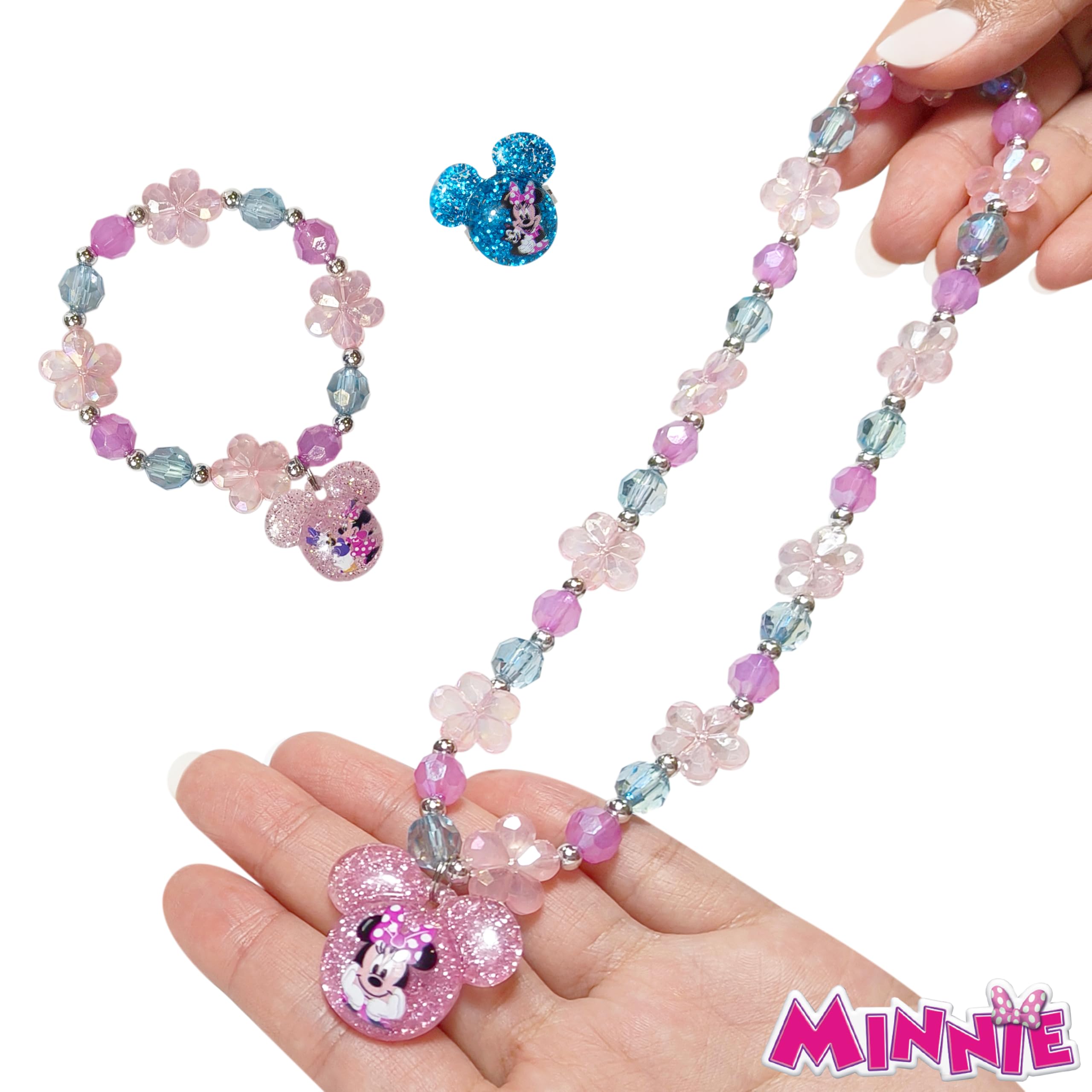 LUV HER Minnie bracelet close-up showing emblem text for imaginative play