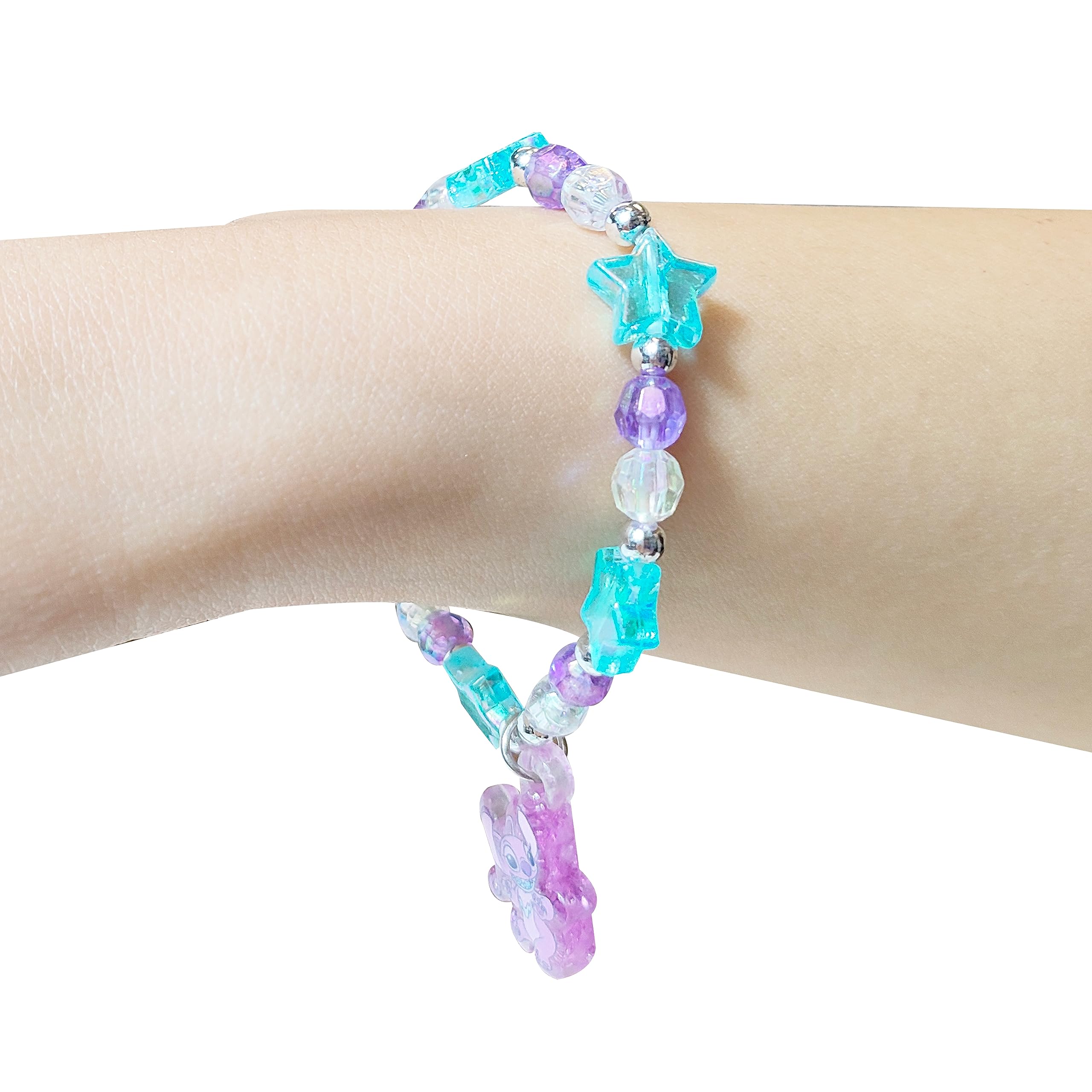 Close-up of pink star emblem on LUV HER Stitch Play jewelry