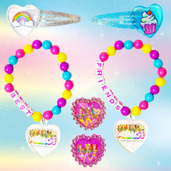 LUV HER XOMG POP ring pair closeup highlighting sparkly finishes for pretend-princess moments.