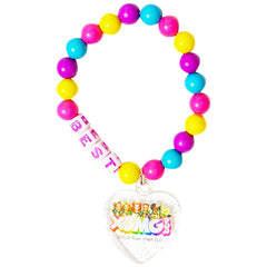 LUV HER XOMG POP winter motifs detail on accessories adding magical flair.