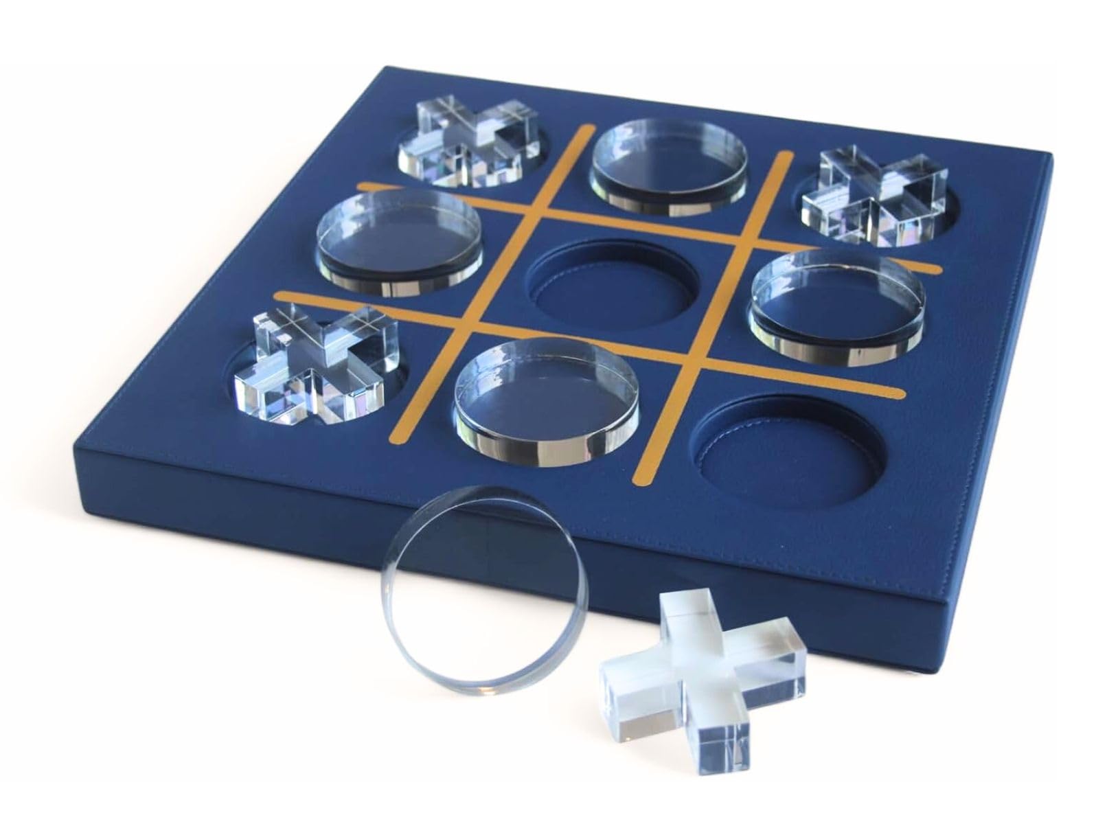 LuxLand Home Tic Tac Toe board featuring blue leather and acrylic pieces, a stylish coffee table centerpiece.