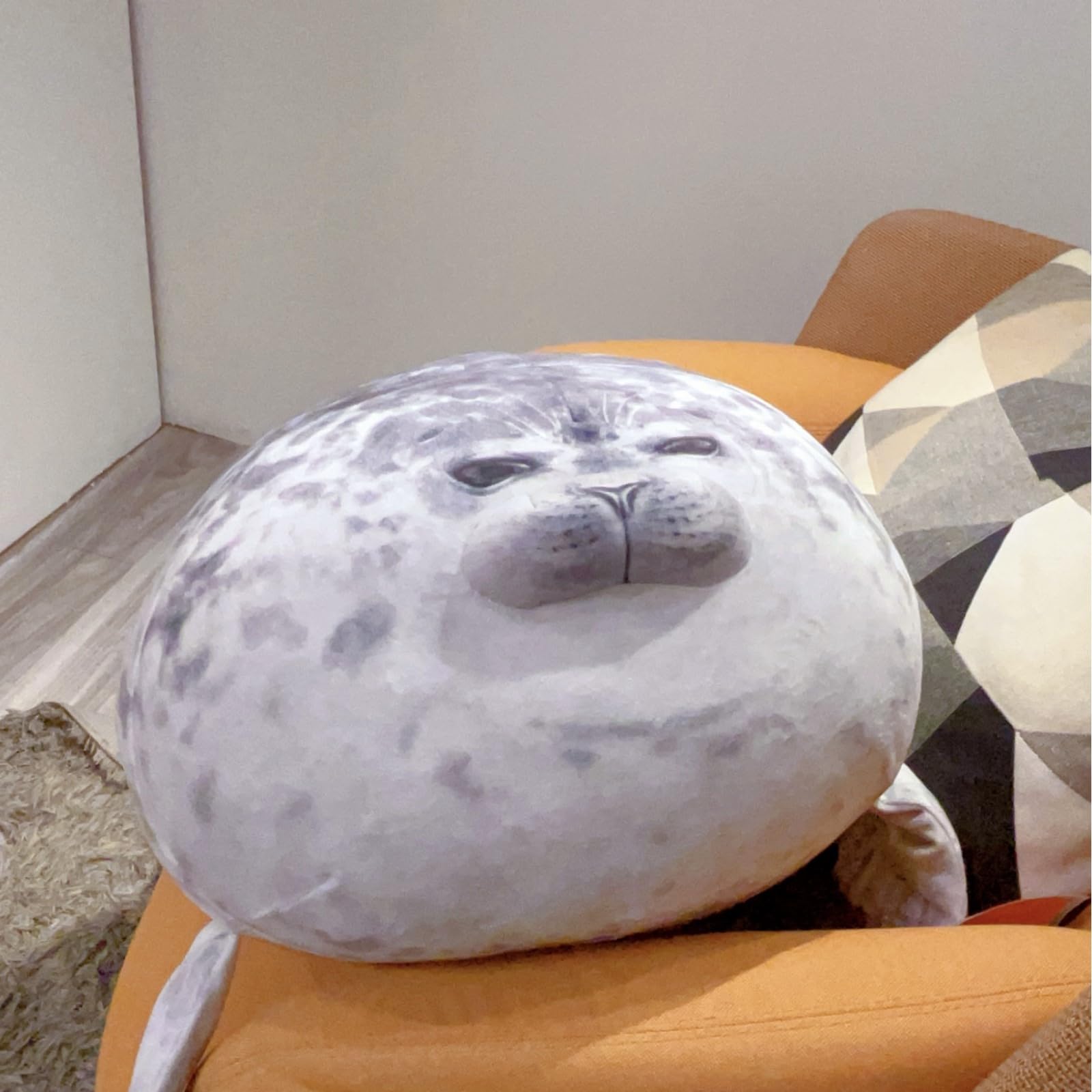 LUXSIT seal pillow after unpacking, gently fluff to restore loft.