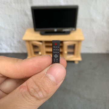 Lynkaye 1:12 dollhouse fireplace in a living room setup with TV.