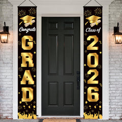 M AMFEOV graduation porch banner with congrats grad visible from distance