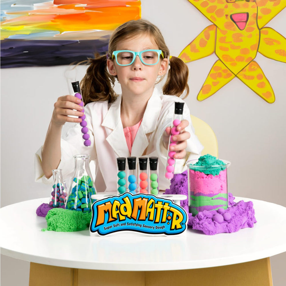Kids molding with MAD MATTR blue during imaginative, hands-on play