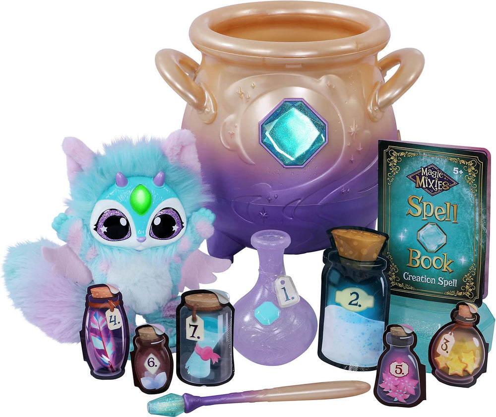 Magic Mixies Cream Tea Cauldron misting reveals blue plush for imaginative play