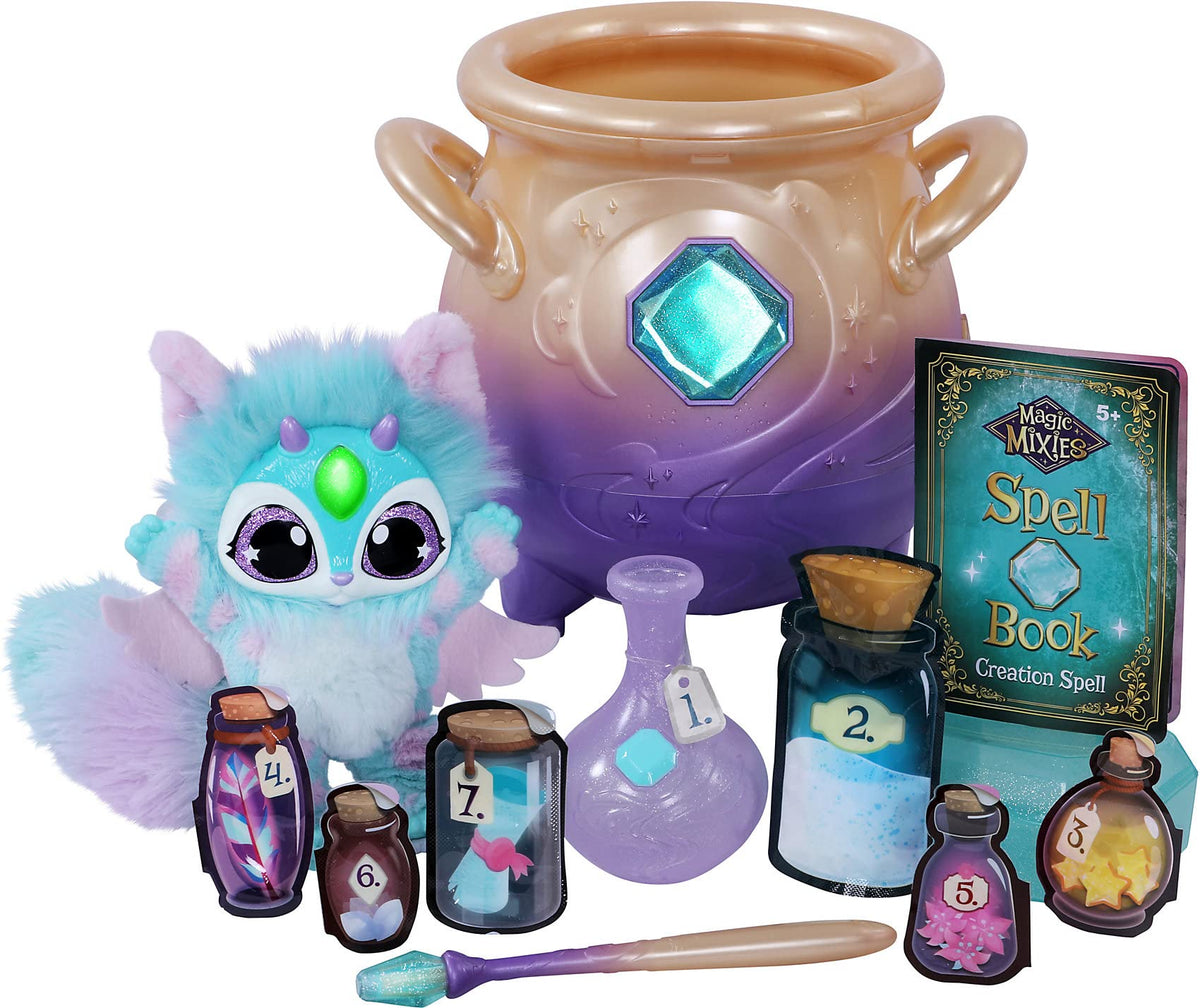 Magic Mixies Cream Tea Cauldron misting reveals blue plush for imaginative play