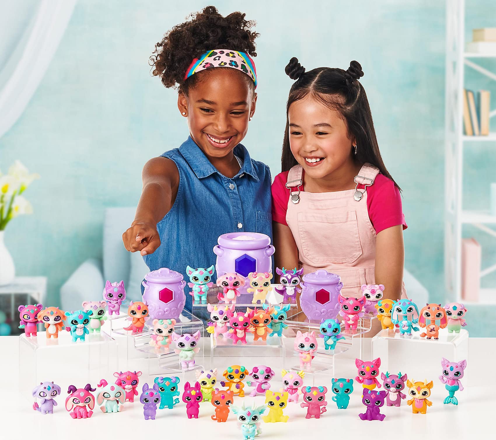 Magic Mixies Mixlings collectible figures image featuring multiple Mixlings ready to join your spell.