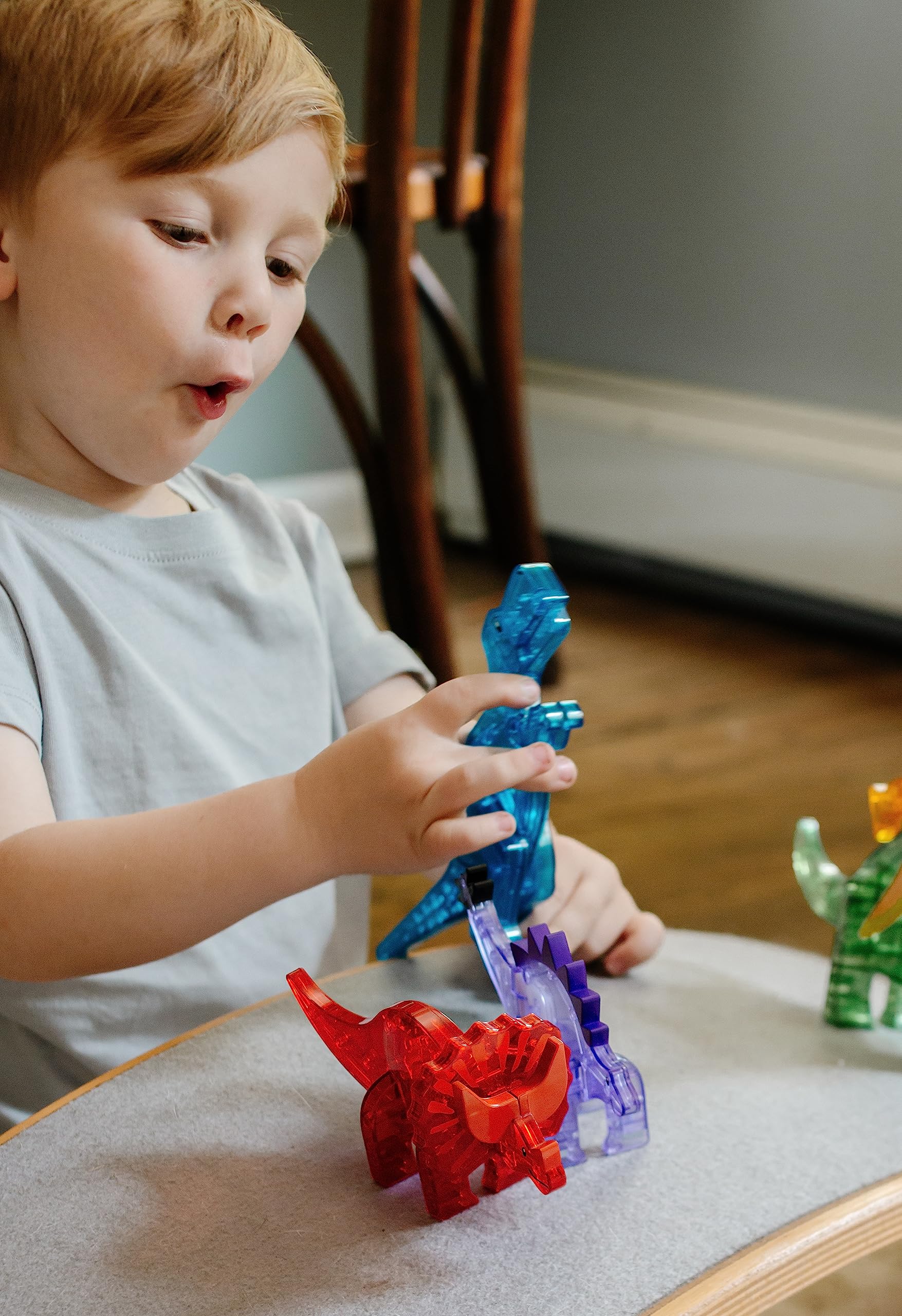 MAGNA-TILES Dinos Stegosaurus purple figure invites action-packed prehistoric adventures.