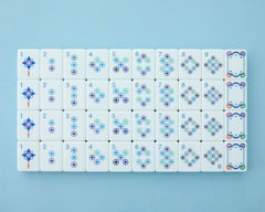 Celestial tiles are smaller and lighter for travel-friendly play.