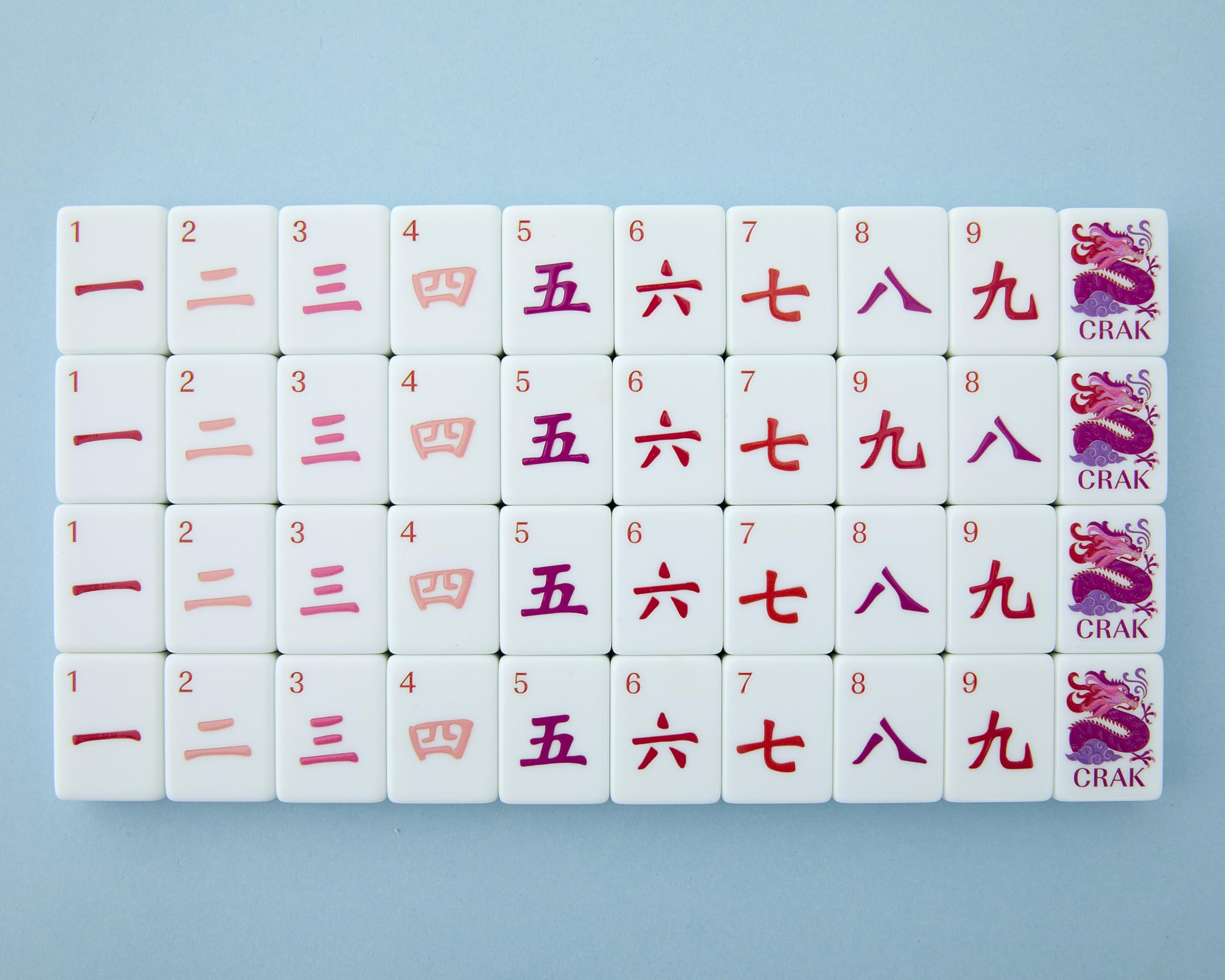 Celestial tile bag keeps Mahjong Co set safe and portable.
