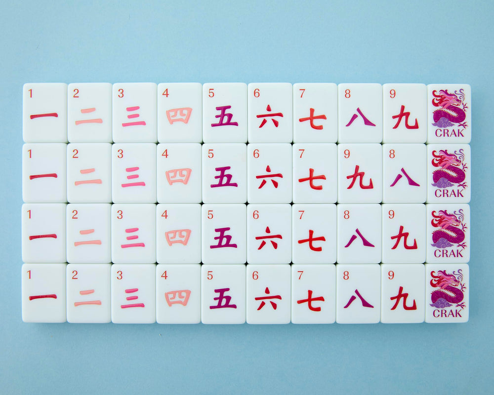 Celestial tile bag keeps Mahjong Co set safe and portable.