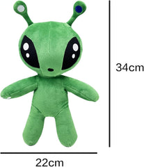 MAIPAI green alien plush held in hand, demonstrating compact, portable size.