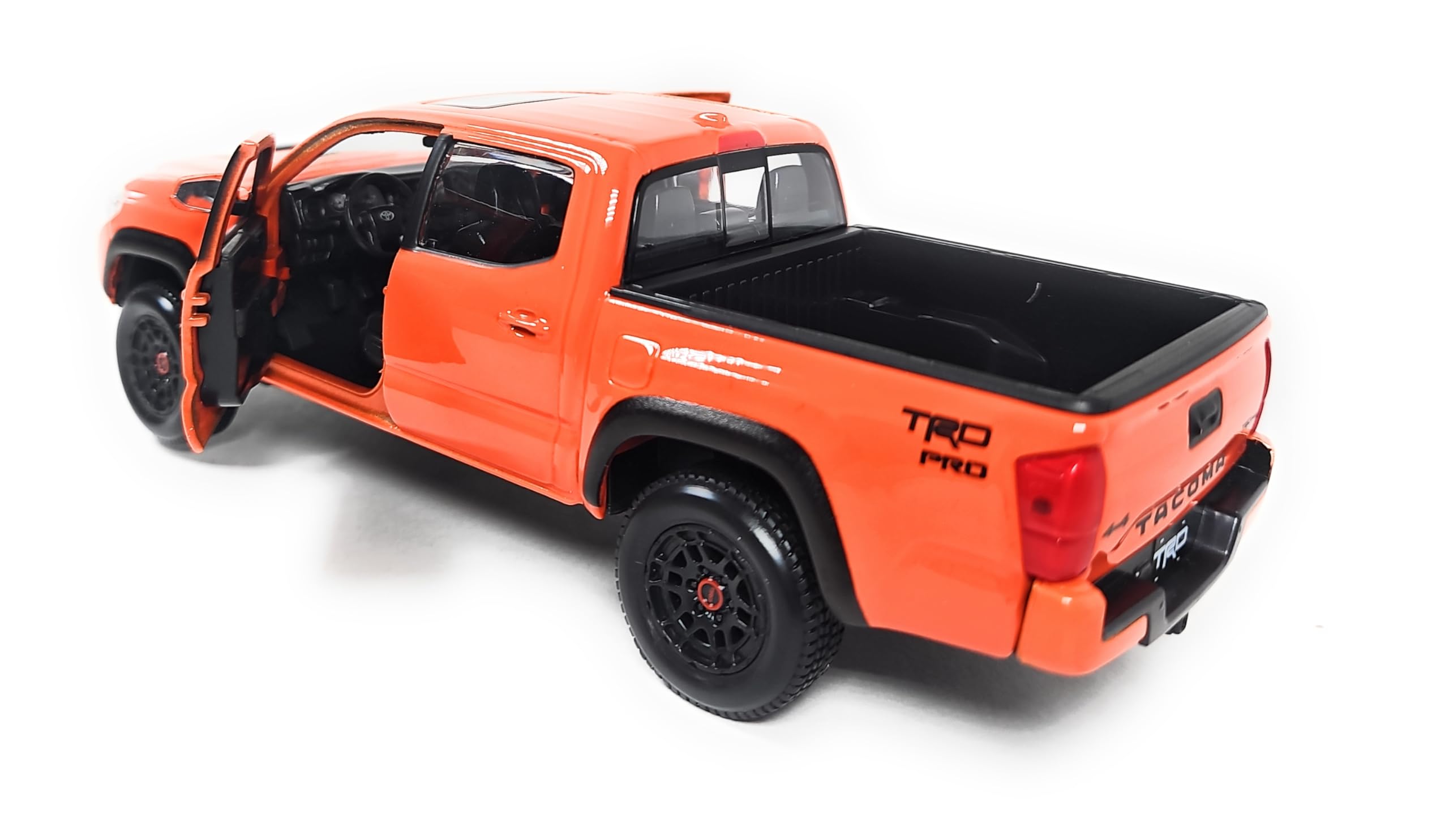 Maisto Tacoma TRD Pro off-road tyre detail highlighting rugged capabilities for display.