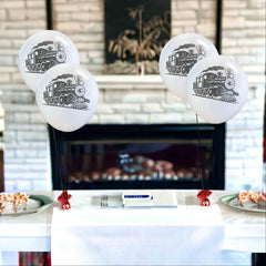 Close-up of Malayan train balloons showing durable latex for vibrant party setup.