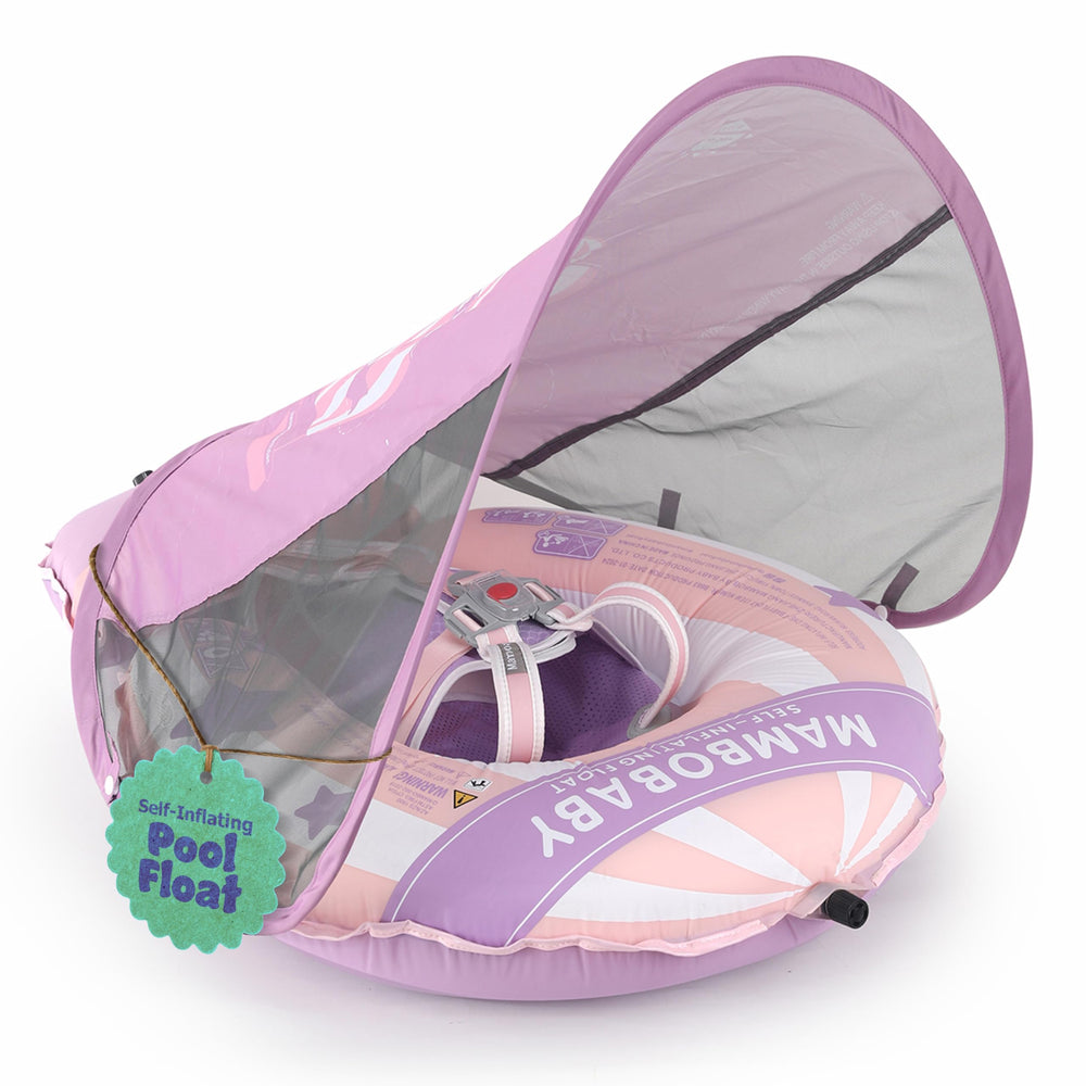MAMBOBABYFLOAT Light Traveler canopy extended shields baby from sun while swimming.