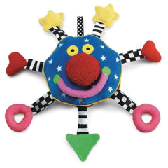 Manhattan Toy Baby Whoozit travel loop easily attaches to strollers and car seats.