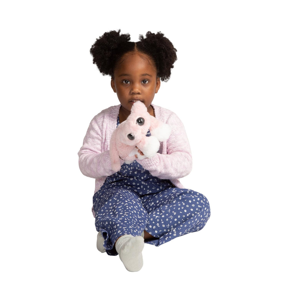 Manhattan Toy Mochi pink Lanky Cat on shelves doubles as nursery decor.