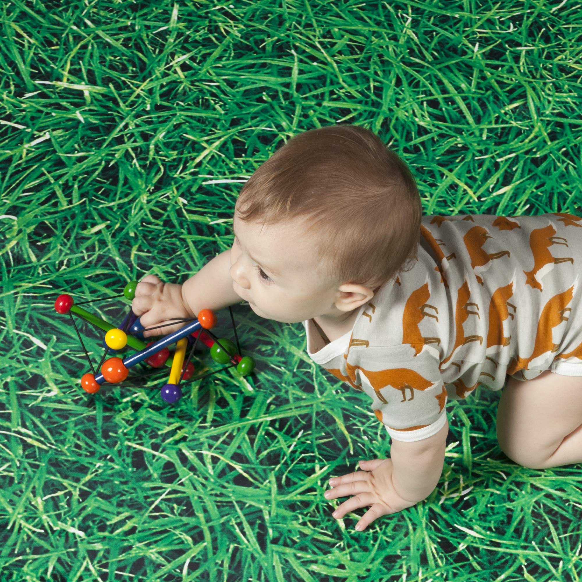 Manhattan Toy Skwish Classic 6 teether supports gum relief during play.