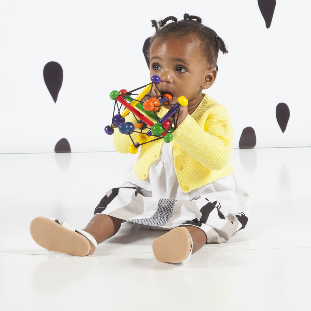 Manhattan Toy Skwish Classic 6 travel-friendly design fits diaper bags.