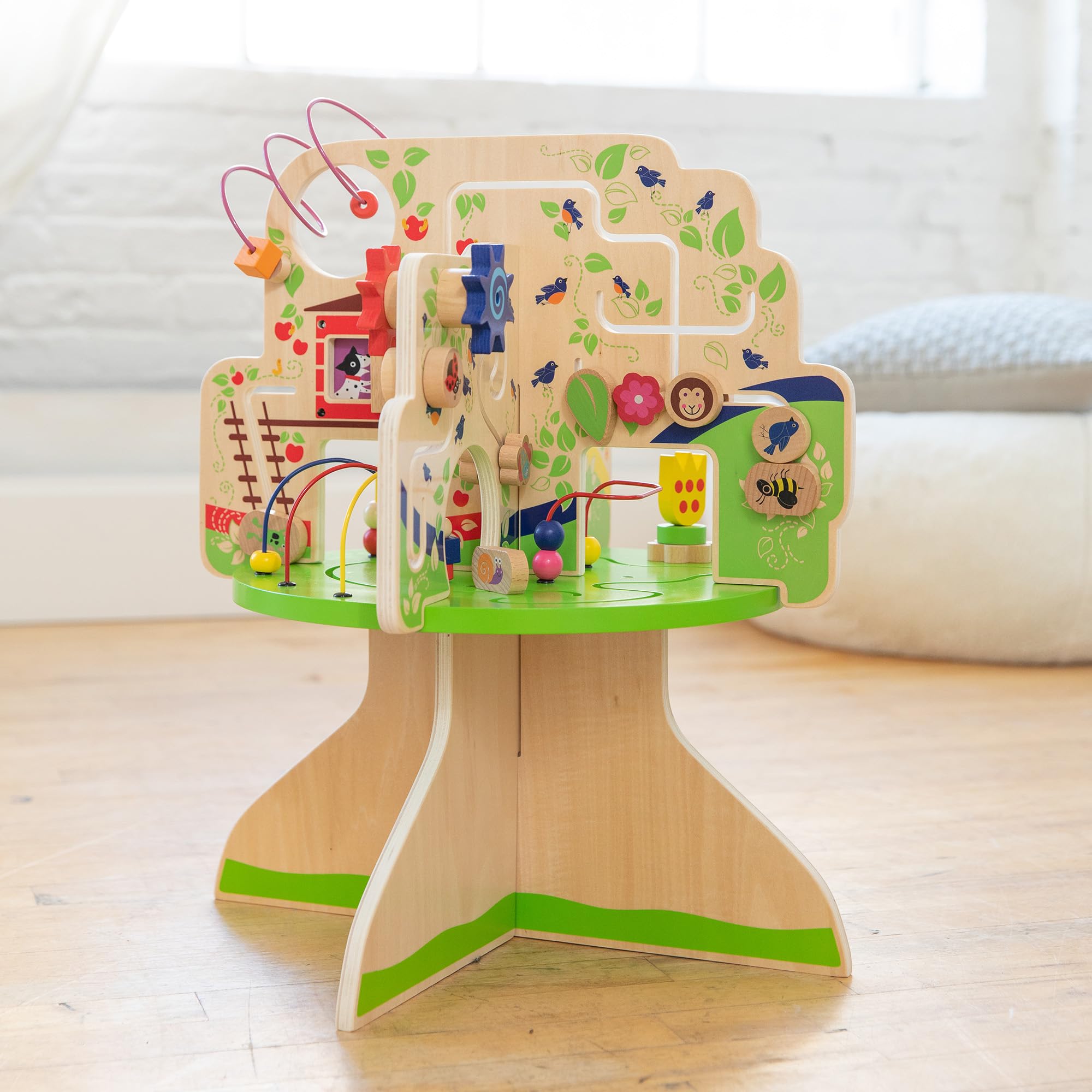 Manhattan Toy Tree Top Adventure springy flower adds playful tactile feedback.