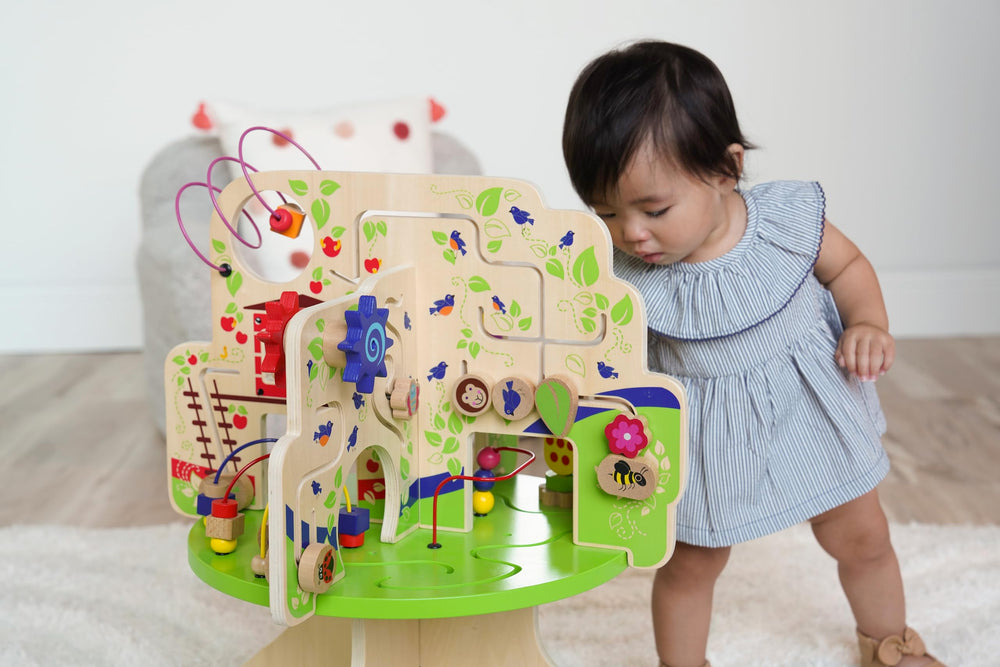 Manhattan Toy Tree Top Adventure toddler play supports seated and kneeling sessions.