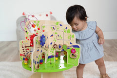 Manhattan Toy Tree Top Adventure toddler play supports seated and kneeling sessions.