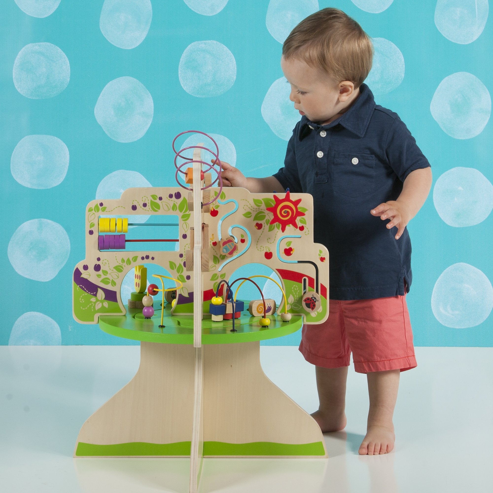 Manhattan Toy Tree Top Adventure wooden finish uses a water-based non-toxic coating.