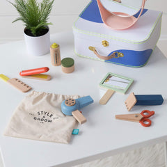 Manhattan Toy wooden comb for detailed hairstyling play.