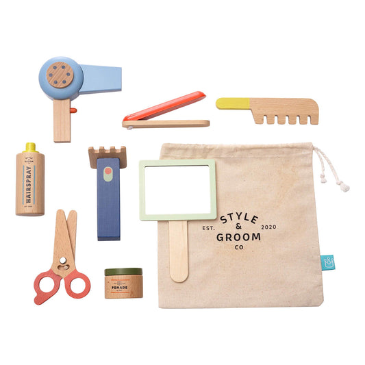 Manhattan Toy wooden hair dryer for realistic pretend styling sessions.
