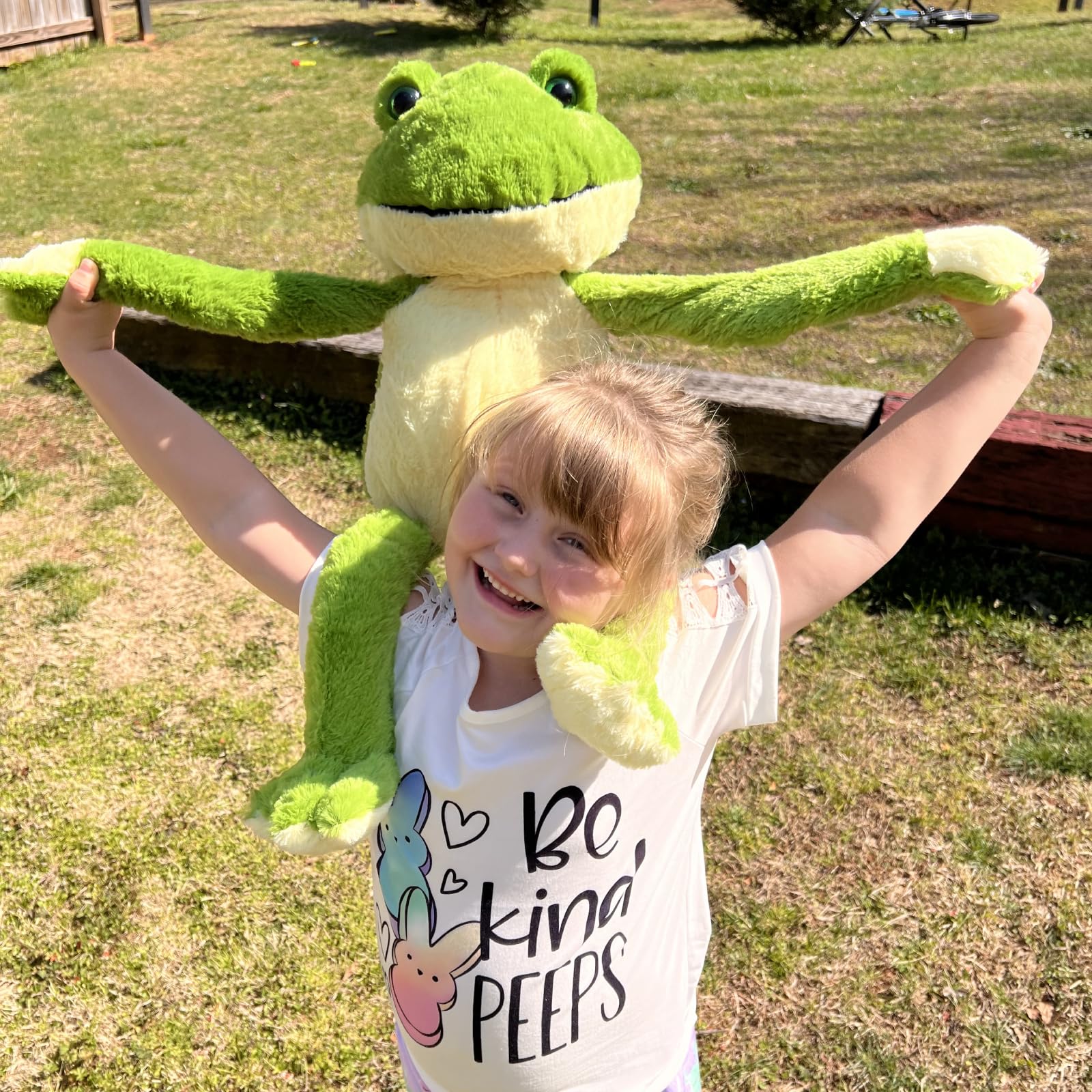 MaoGoLan large frog plush draped over curtains for decorative charm.