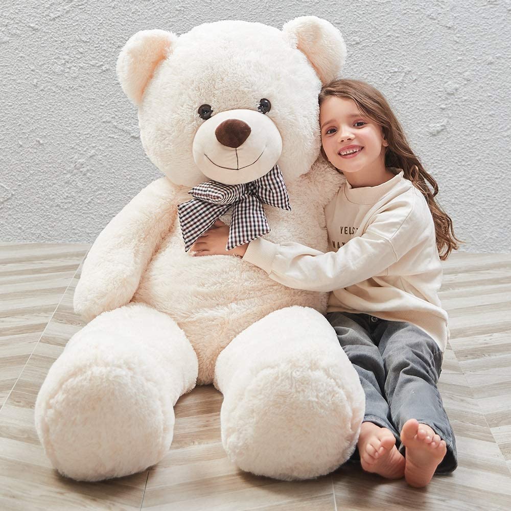 MaoGoLan 47-inch giant teddy bear, perfect for cozy hugs and bedroom decor.