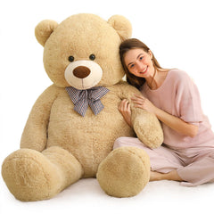 MaoGoLan Giant Teddy Bear in a cozy bedroom setup enhances warm ambiance.
