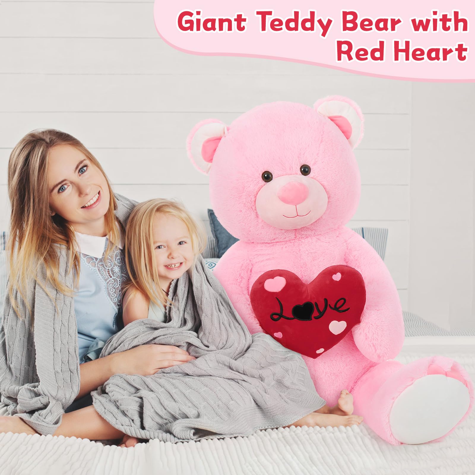 MaoGoLan teddy bear with heart pillow close-up, a charming gift idea.
