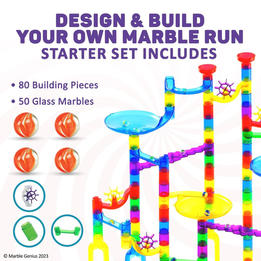 Glass marbles roll along Marble Genius starter set paths for tactile fun.